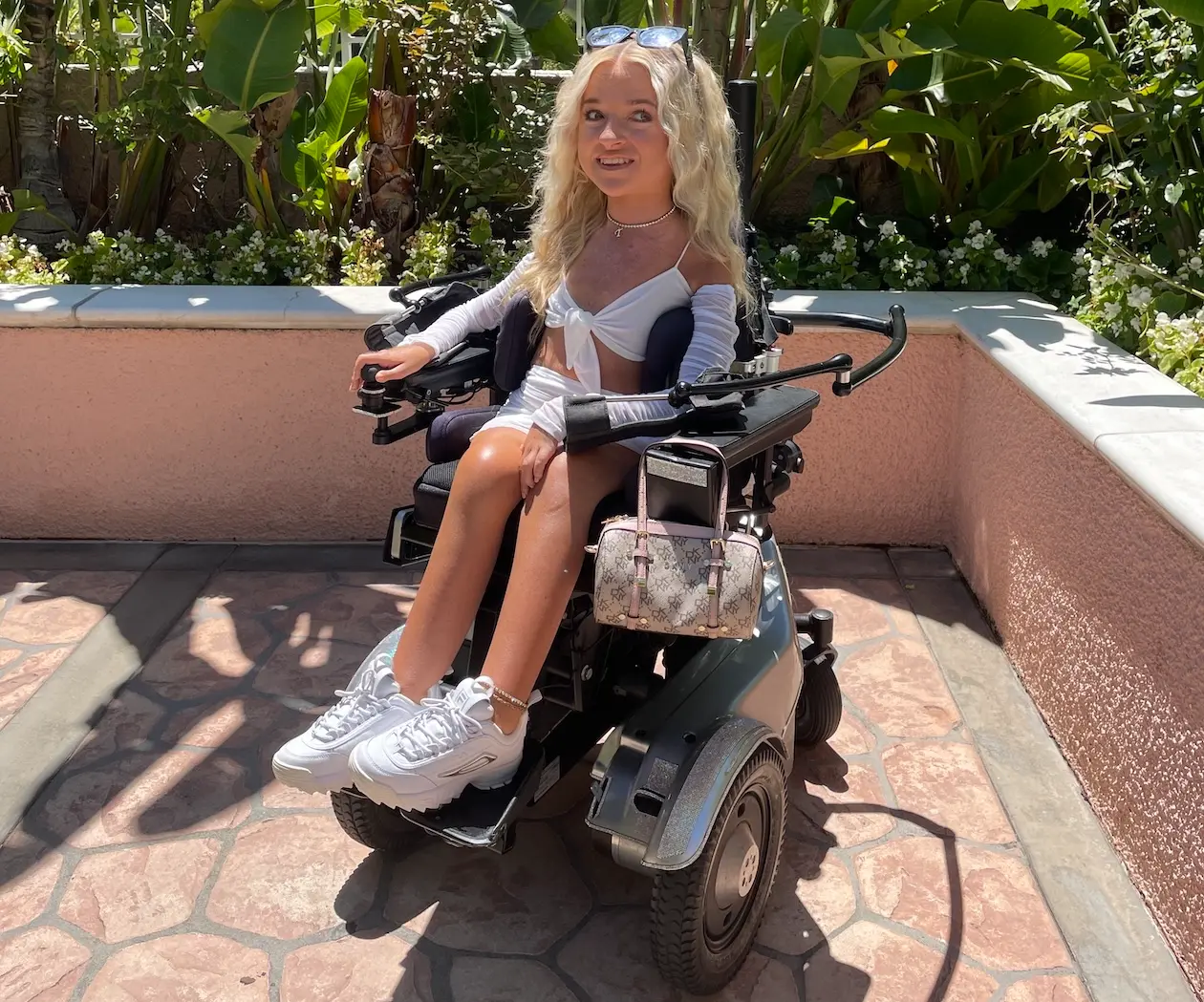 Tilly, sitting in the sun in her sparkly silver Balder F380
