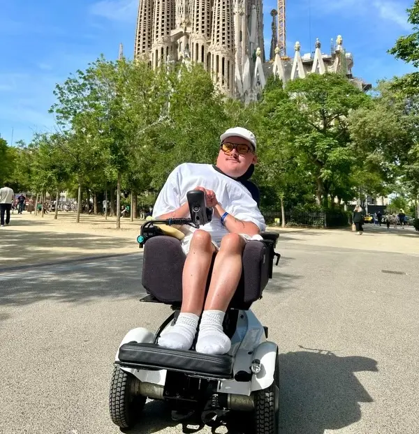 Lewis, sitting in his white Balder F380 in front of the Sagrada Familia in Barcelona