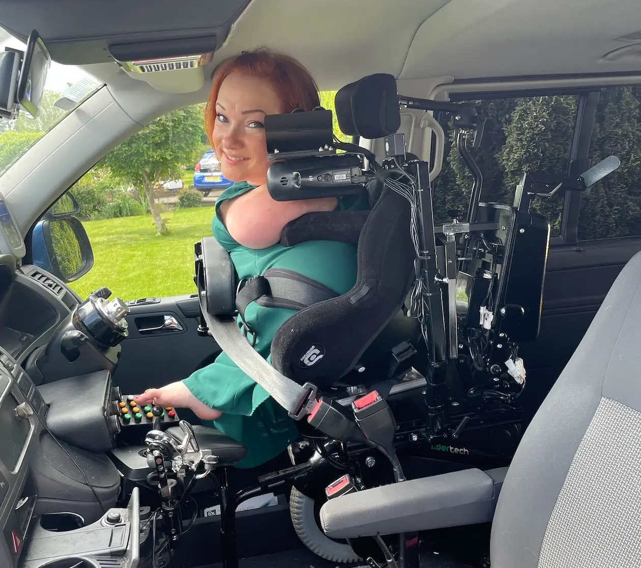 Vicky, sitting in her Balder F380 in the car