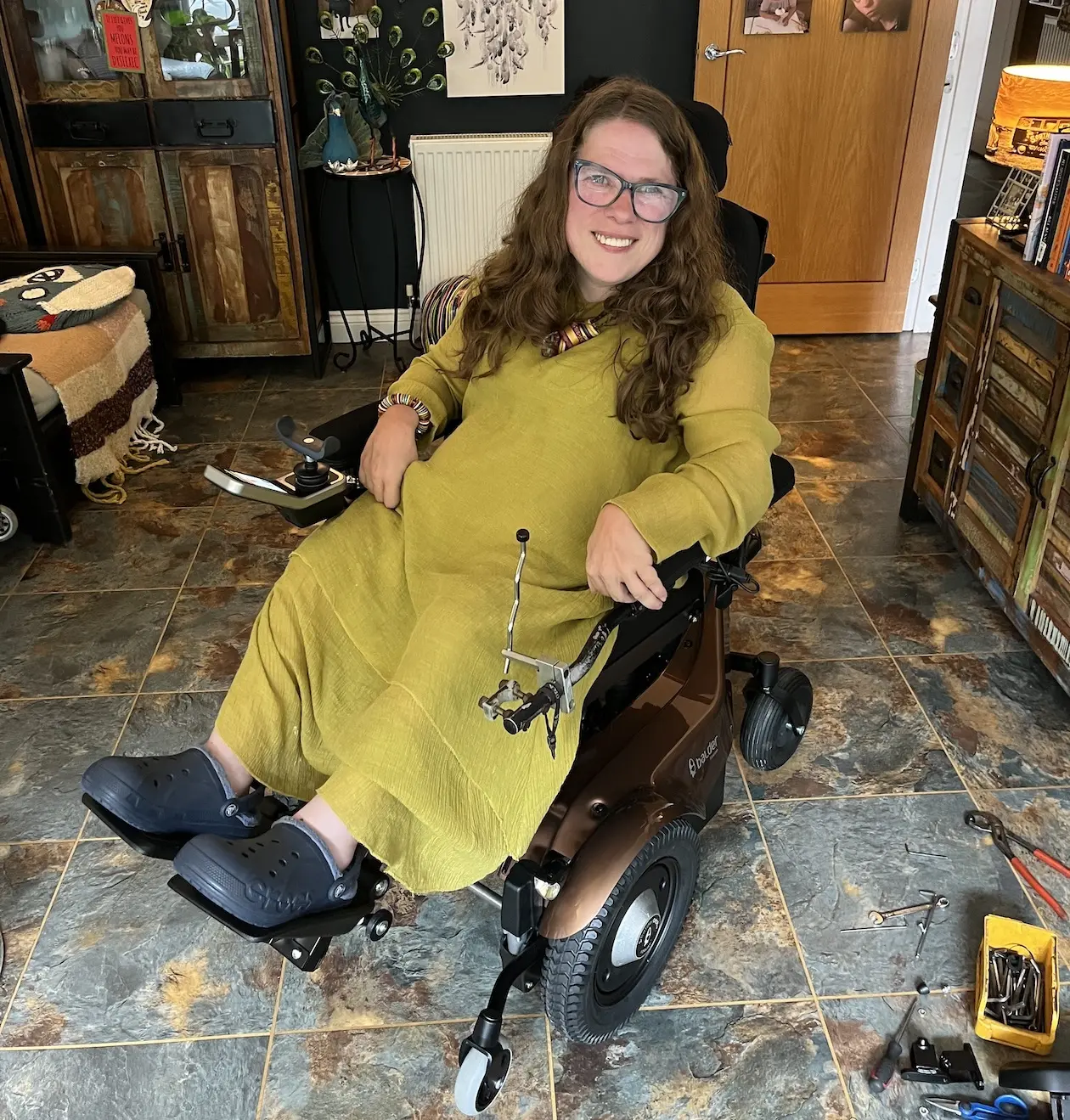 Lorna, sitting indoors, in her Balder F390